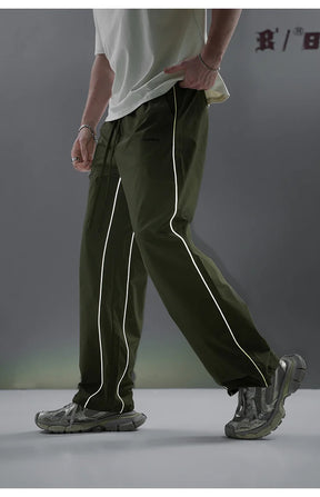 REFLECTIVE STRIPED TRACK PANTS