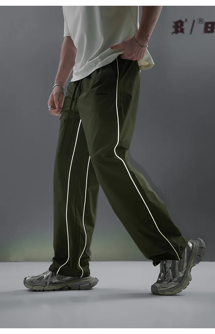 REFLECTIVE STRIPED TRACK PANTS