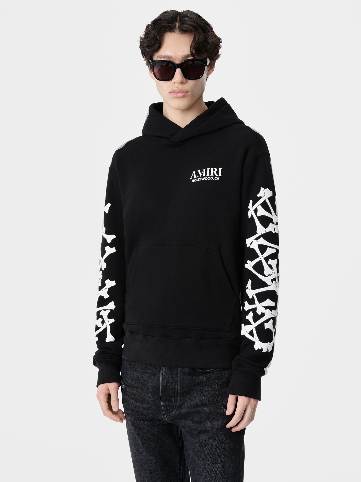 SIGNATURE BONES DETAILING AND CORE AMIRI LOGO.
