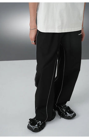 REFLECTIVE STRIPED TRACK PANTS