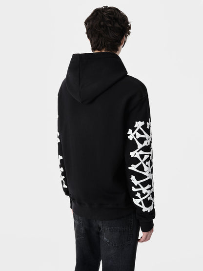 SIGNATURE BONES DETAILING AND CORE AMIRI LOGO.